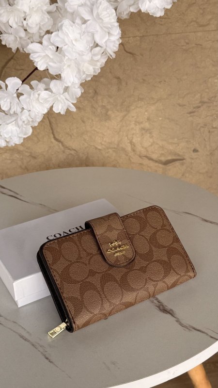 محفظة coach